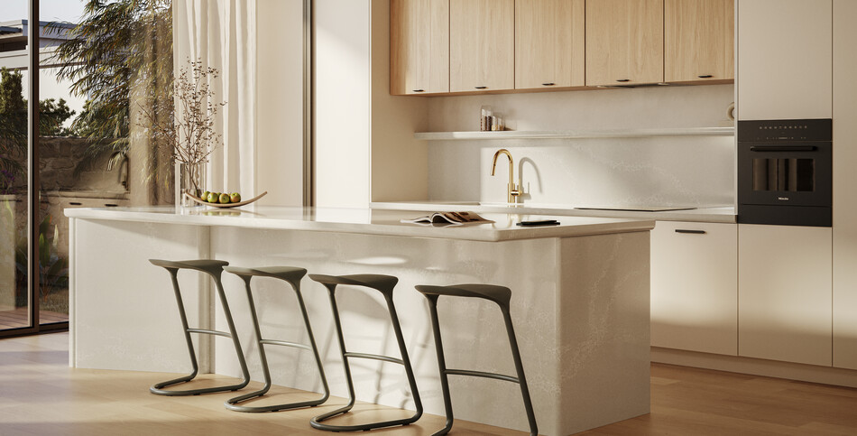 A kitchen island with an overhang for seating in a cool gray advanced fusion Alpine Mist.