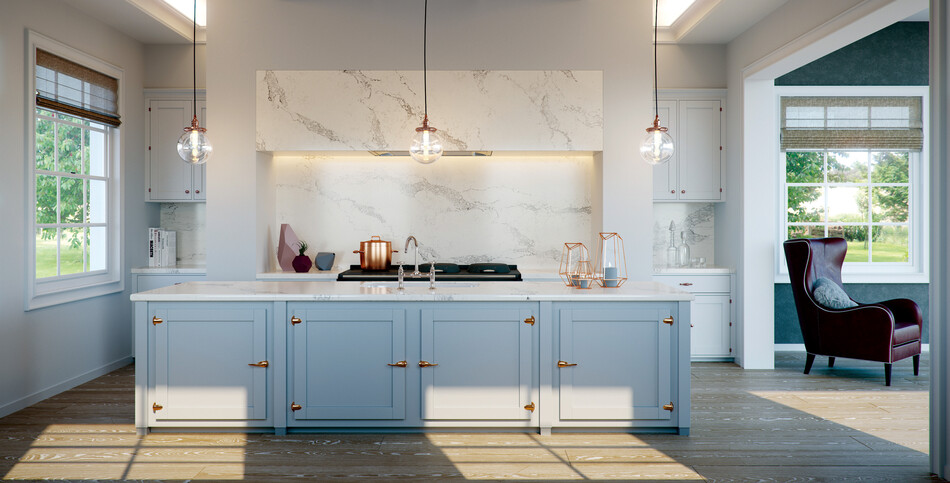 A quartz island and backsplash with a feathered dove white base, contrasted by broad light-gray veins.