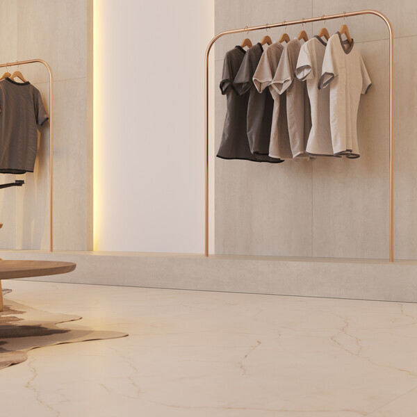 Porcelain flooring of pearl white backdrop crisscrossed with crackling dark gray veins.